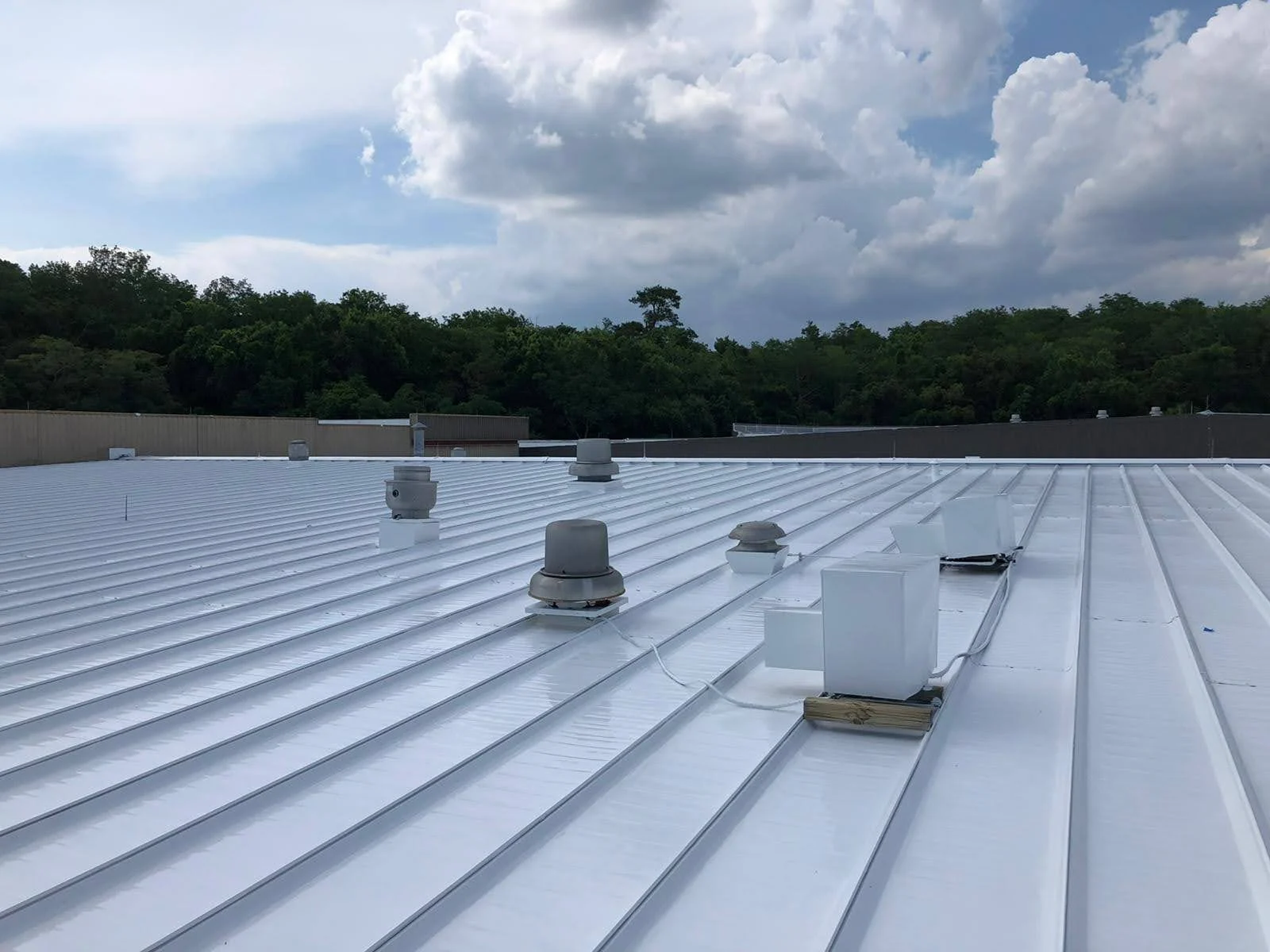 Commercial roof service agreement inspection in Rhode Island